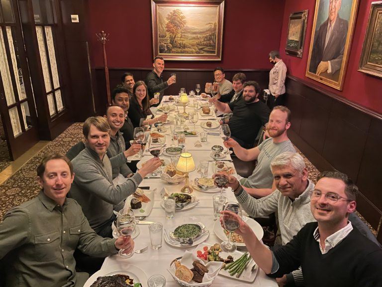 DevZero’s investors, advisors, and early employees at a dinner in January 2022