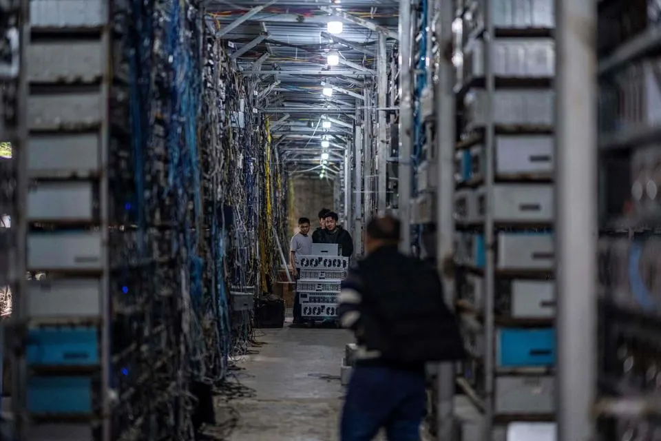 a group of workers transferring cryptocurrency