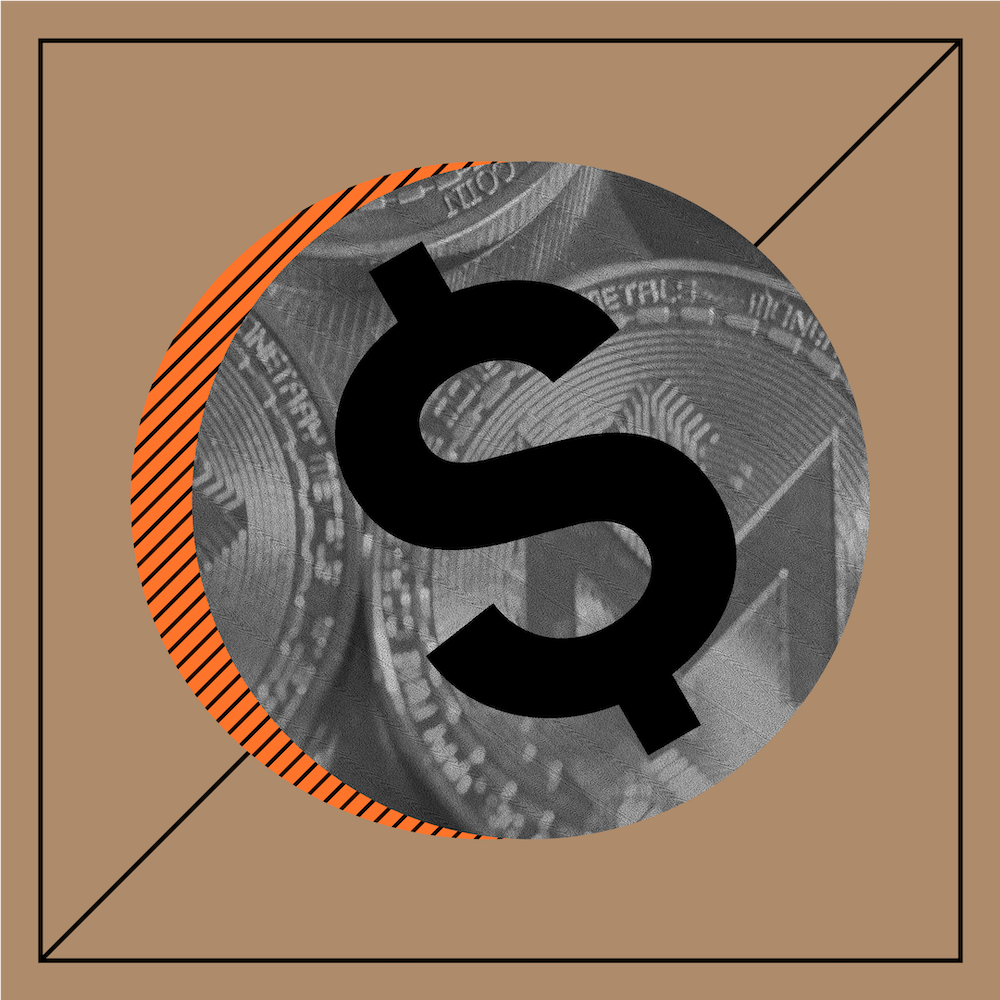 A silver coin with a black dollar sign